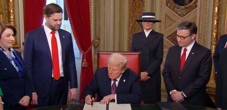 President Donald Trump signing recent executive orders in 2025, highlighting major policy changes and their implications for immigration, energy, and social policies.