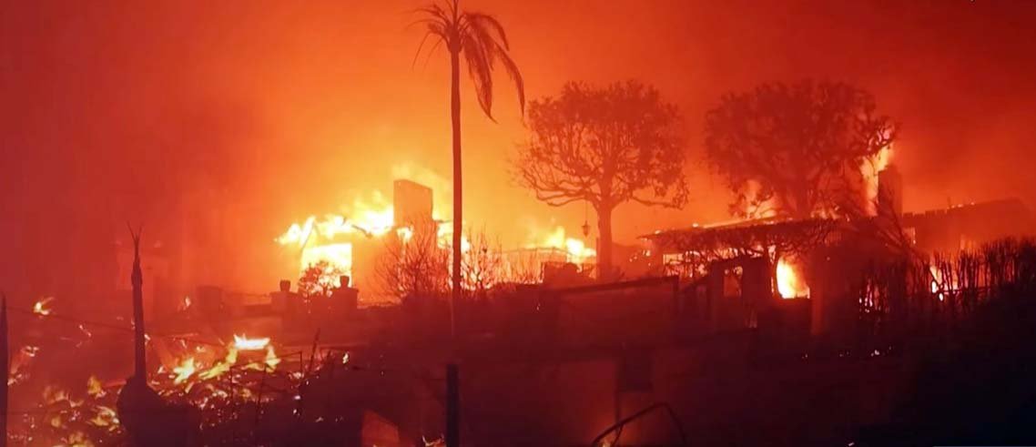 Los Angeles fire damage showing burnt homes and widespread destruction from the 2025 wildfire disaster.