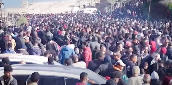 Gaza civilians relocated and gathered in the Gaza Strip amid displacement crisis.