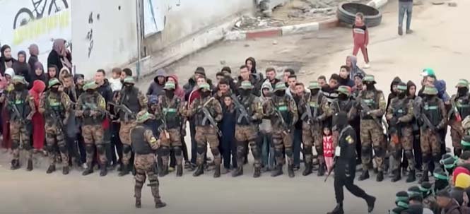 Hamas fighters armed and patrolling in Gaza amid ongoing conflict and ceasefire negotiations.