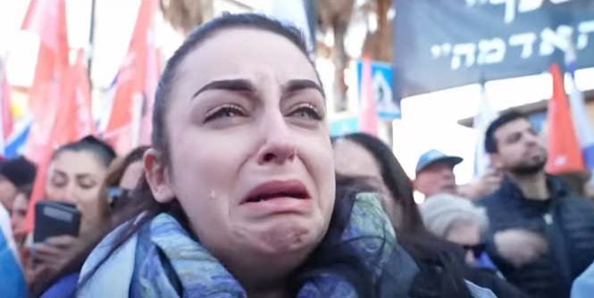 People mourn the tragic loss of Shiri, Ariel, and Kfir Bibas, honoring their memory amid national grief and calls for justice.