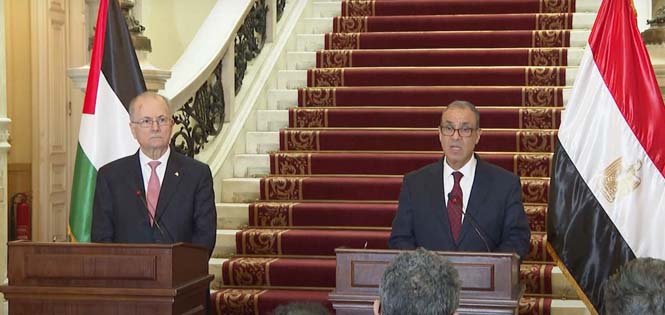Palestinian Prime Minister Mohammad Abdullah Mohammad Mustafa and Egypt's Foreign Minister Badr Ahmed Mohamed Abdelatty during a press conference at the Arab Summit discussing Gaza reconstruction and humanitarian aid.